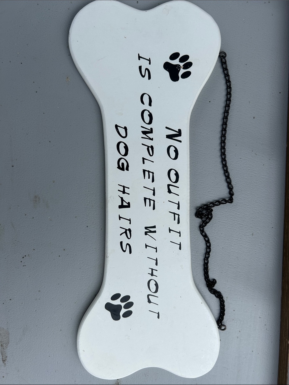 White Bone-Shaped Dog Sign - No Outfit Is Complete With Dog Hairs